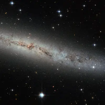 Hubble Eyes Galaxy as Flat as a Pancake